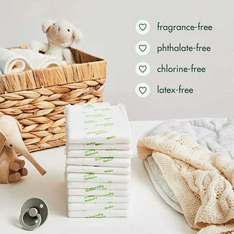 Perfect for long car rides, plane trips, overnight protection, and more — Naturally Nature booster pads in a basket