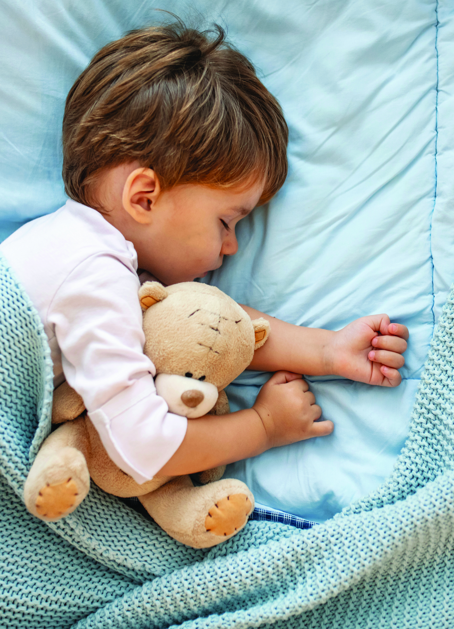 Toddler sleeping peacefully through the night with Naturally Nature booster pads